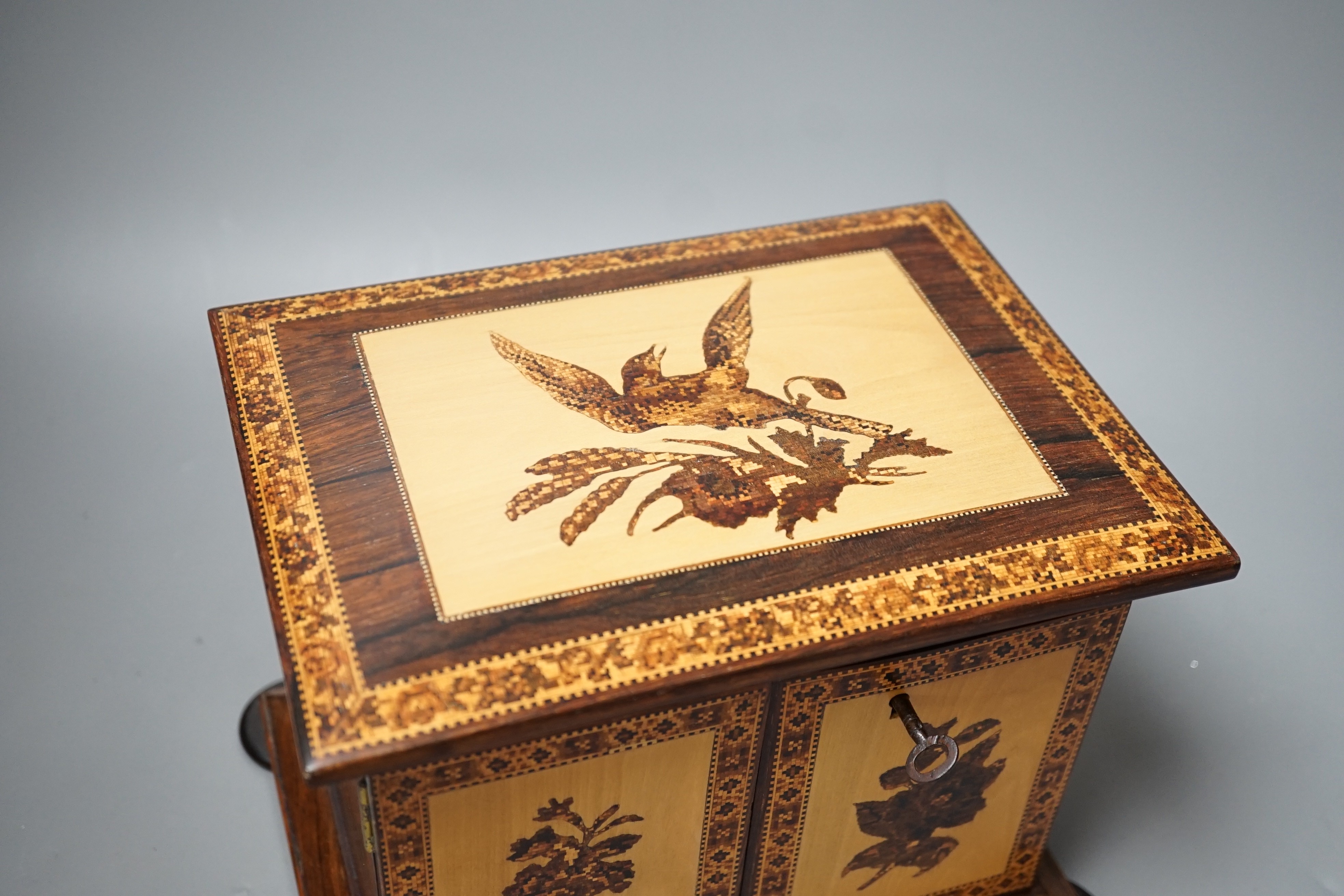 A Tunbridge ware rosewood and holly ground tesserae mosaic sewing cabinet, mid 19th century, 17.5cm high